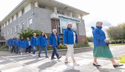  A group of Household Interviewers walking in a line